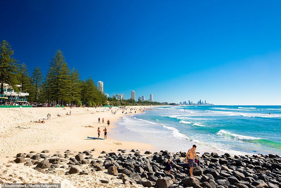 BURLEIGH BEACH, GOLD COAST, QUEENSLAND: This beach is described by mustdobrisbane.com as a 'jewel in the Gold Coast's crown', with the site declaring it a 'surf haven' and waxing lyrical about its 'clear blue waters' that are 'ideal for swimmers and families'. Between May and November sunbathers should look up from time to time - they might spot a migrating humpback whale or two