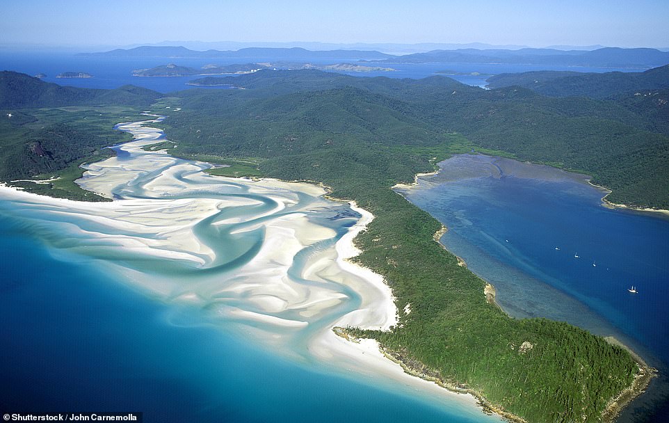 WHITEHAVEN BEACH, WHITSUNDAY ISLAND, QUEENSLAND: Behold Utopia. What helps to make this glorious seven-kilometre- (4.3-mile) long beach - on the largest of the 74 islands in the Whitsundays - so dreamy is the inlet where sand and water mix together to produce a mesmerising blend of colours