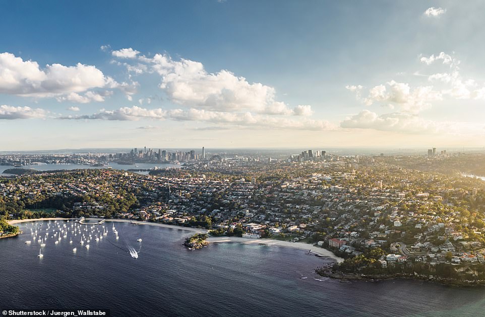 BALMORAL BEACH (LEFT) AND EDWARDS BEACH (RIGHT), SYDNEY: This stunning aerial drone shot shows two of Sydney's most photogenic strips of sand, separated by Rocky Point. They're located in a distinctly upscale district and are often merged descriptively and referred to as 'Balmoral'