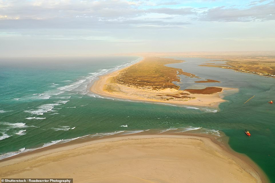 THE COORONG, SOUTH AUSTRALIA: The Coorong, south of Adelaide, lays claim to being Australia's longest continuous beach. This epic strip of sand stretches for 194km (121 miles) from Cape Jaffa to the Murray Mouth (above)