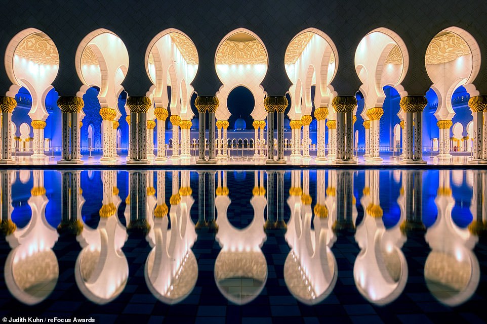 Topping the podium in the 'Architecture' category for non-professional photographers, this picture shows the 'fairytale ' Sheikh Zayed Mosque in Abu Dhabi after sunset. Photographer Judith Kuhn says: 'A unique lighting system reflects the phases of the moon'