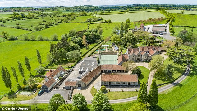 Alongside the 15th-century grade II listed manor, the estate boasts an indoor swimming pool, two cottages, a tennis court, working flour mill and deer park