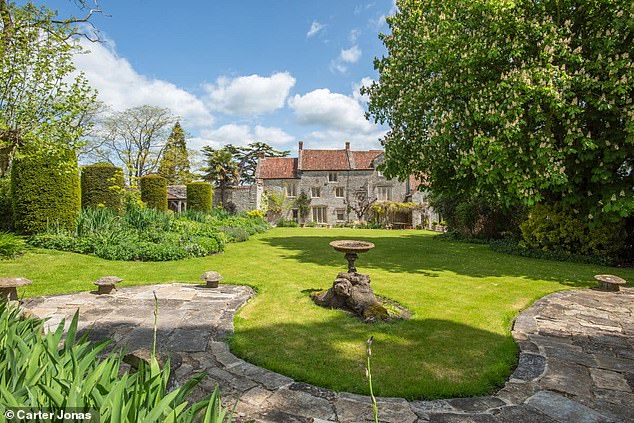 The manor comes with beautifully arranged gardens developed over decades by Mr Saul