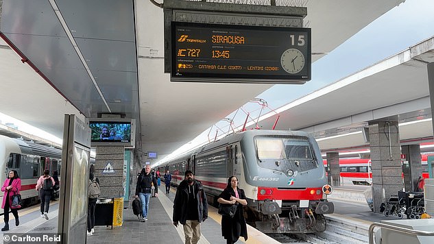 Pictured above is the slow-speed train from Napoli in mainland Italy to Siracusa in Sicily