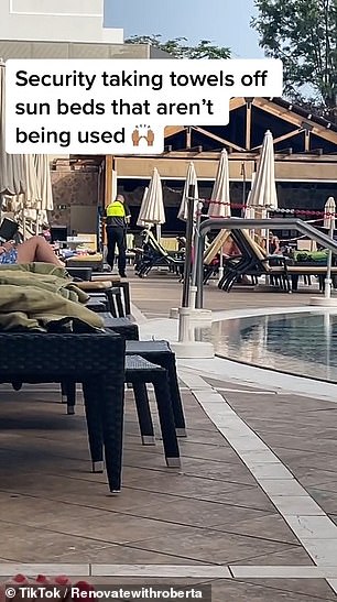 The security guard involved in the operation can be seen wandering round the poolside taking notes while wearing a luminous yellow jacket