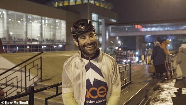 At the finish line: Timmis pictured in Ufa, having broken the pan-European cycling speed record