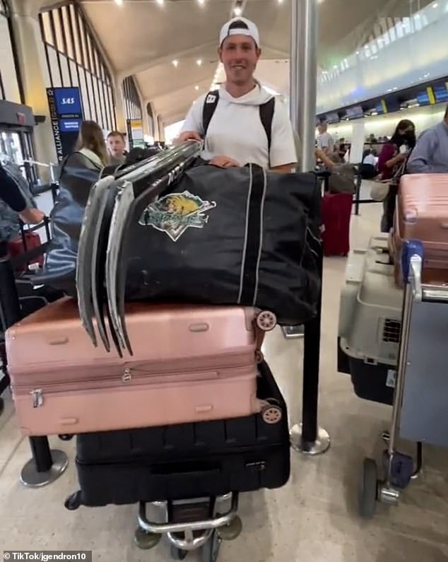 She explained that pets must fly in an airline approved crate, adding in the comments that she was able to purchase the one they use for Puck on Amazon. Pictured: Jackie's travel companion with their luggage. Puck's crate is on the trolley to the right