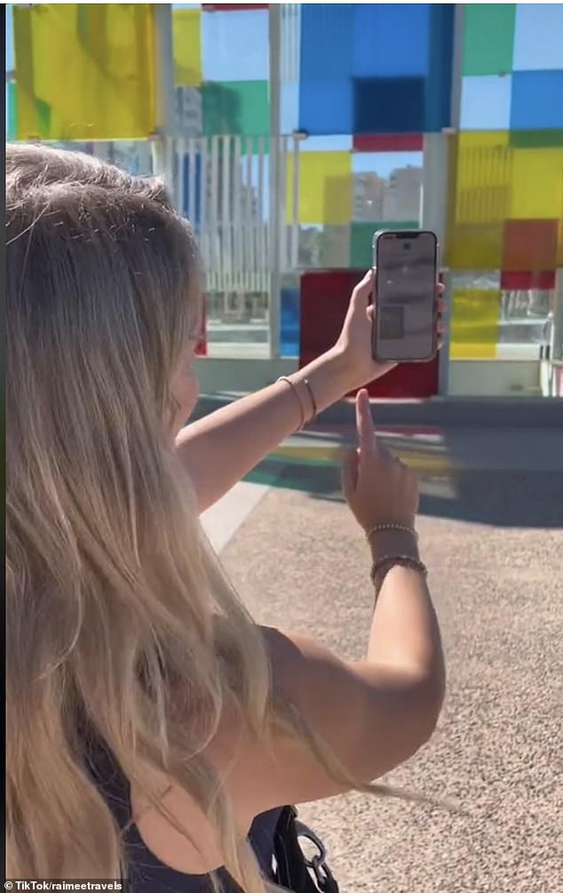 One TikTok traveller demonstrated how to get Google Lens to identify buildings, and scanned a building before her