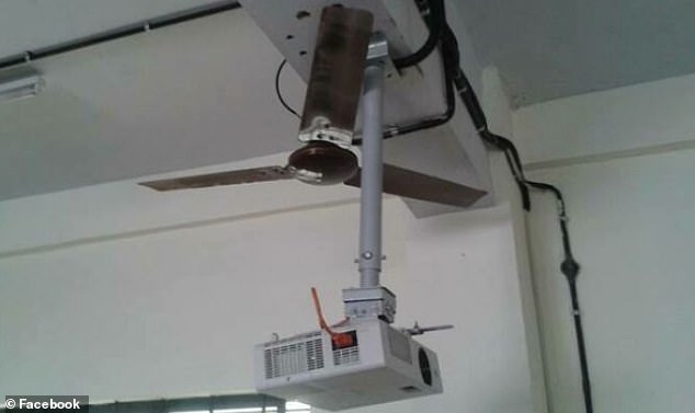 If this fan turned on it could cause chaos, as the projector blocks the blade. Talk about a botched job!