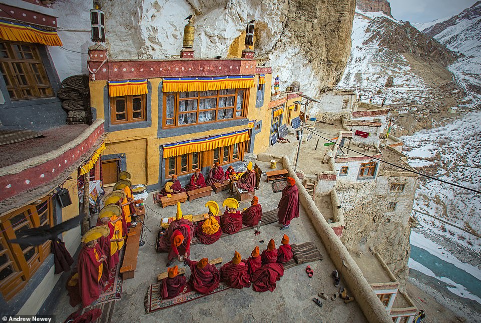 The monks brave the cold as their morning prayers take place on the rooftop of the Phugtal Monastery in temperatures of minus 20 degrees Celsius (minus four Fahrenheit)