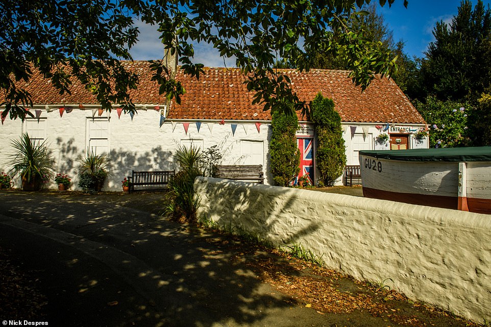 The German Occupation Museum at Les Houards (above) houses military weapons and dioramas with reconstructions of war-era homes and shops
