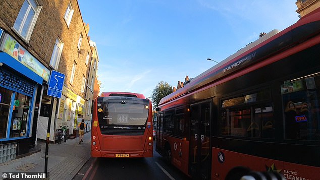 Camberwell, above, is frequently congested, with cyclists sharing road space with swarms of buses