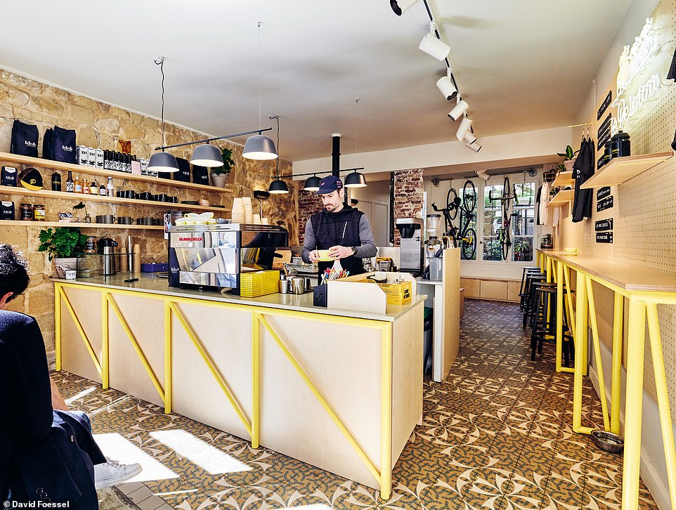 LE PELOTON CAFE, PARIS: Two cycling enthusiasts, Christian Osburn and Paul Barron, from the US, opened Le Peleton Cafe in 2015 to 'bring together their passion for coffee, cycling, and community'. Schneider explains that the design of the café gives 'visual nods to the world of cycling', noting that 'the color yellow, of course, is the color of the jersey worn by the winner of each stage in the Tour de France'
